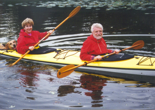 Paul and Sue Ponchillia, in a kayak along with their dog, Ginger.
