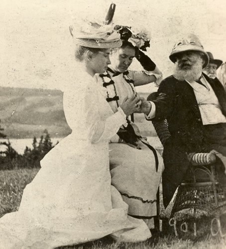 Left to right, Helen, Anne, Alexander Graham Bell, and possibly John Hitz, on a hilltop in Nova Scotia, 1901.