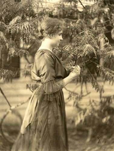 Helen touching branch of a tree
