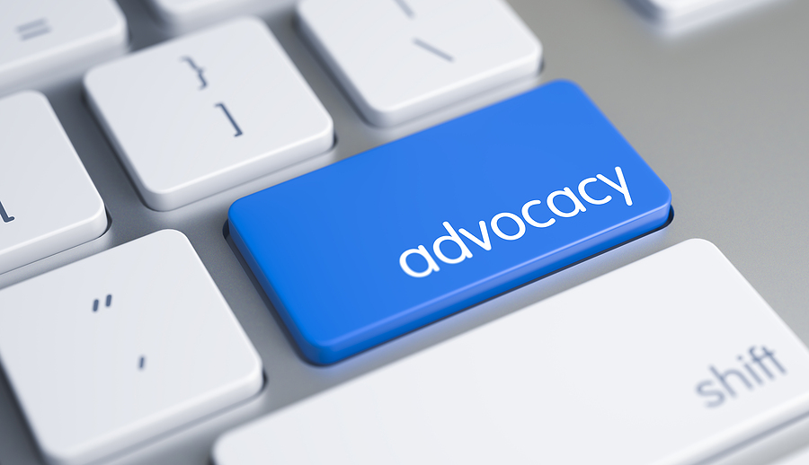 A Keyboard with a Blue Keypad - Advocacy. High Quality Render of a Conceptual Keyboard Keypad. The Keypad is Blue in Color and there is Message Advocacy on It.