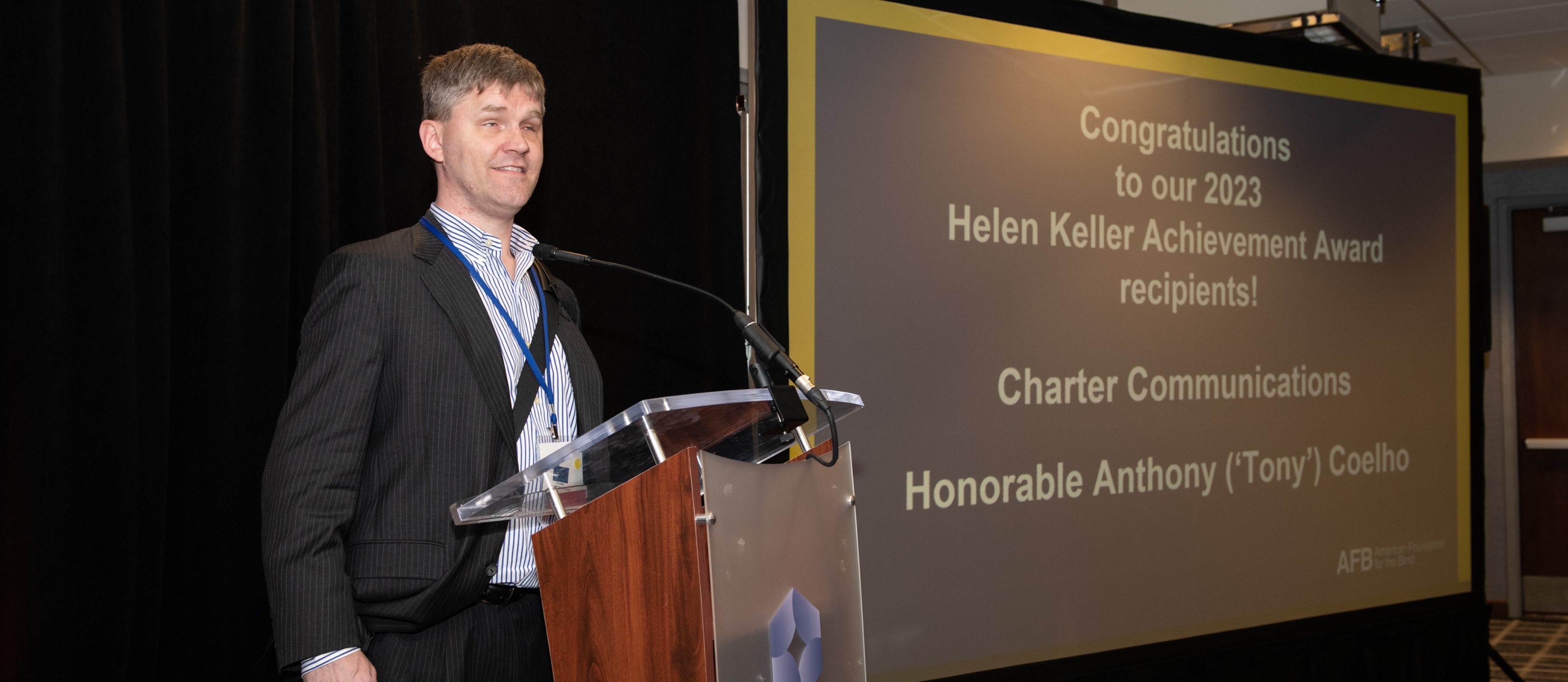 Eric Bridges speaking at the 2023 Helen Keller Achievement Awards.