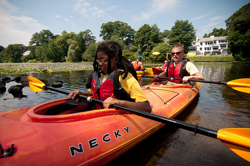 Summer camp: visually impaired girl in kayak