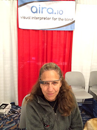 Aira exhibitor demonstrating their app for Google Glass
