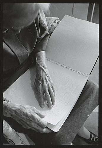 Helen Keller reading braille, October 1965