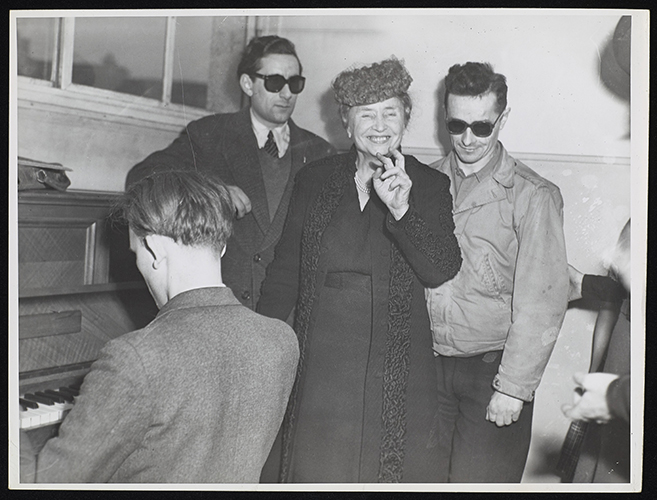 Helen Keller with French veterans in Paris.