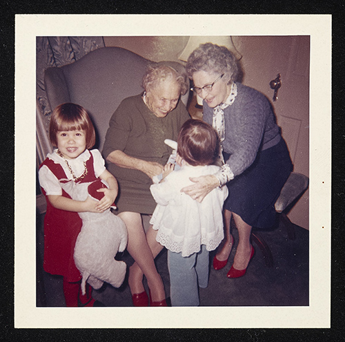 candid color photo of Helen Keller with young relatives and Winifred Corbally in Dallas, Texas, 1961.