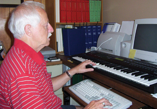 Cover Photo: Photograph of Harvey Miller at the computer using both a piano keyboard and a QWERTY computer keyboard.