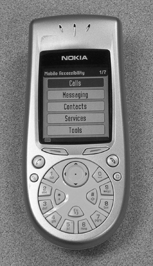 Figure 3: Photo of the Nokia 3650. The screen menu lists Calls, Messaging, Contacts, Services, and Tools.