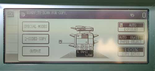 Imagistics touch-screen display, with glare spot, showing controls for Special modes, 2-sided copy, Output, Exposure, Paper select, and Copy ratio.