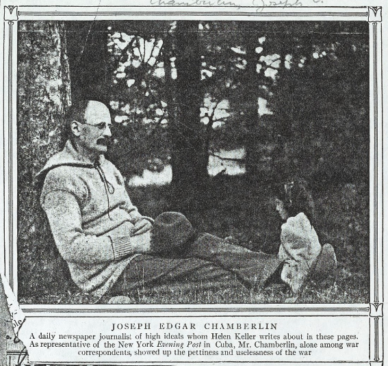 Newspaper clipping of Joseph Edgar Chamberlin, sitting relaxed under a tree. A young girl sits at his feet.